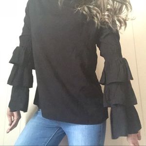 Solitarie black long bell sleeve blouse top